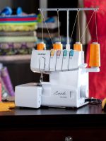 1034D Serger, Heavy-Duty Metal Frame Overlock Machine, 1,300 Stitches Per Minute, Removeable Trim Trap, 3 Included Accessory Feet - Image 5